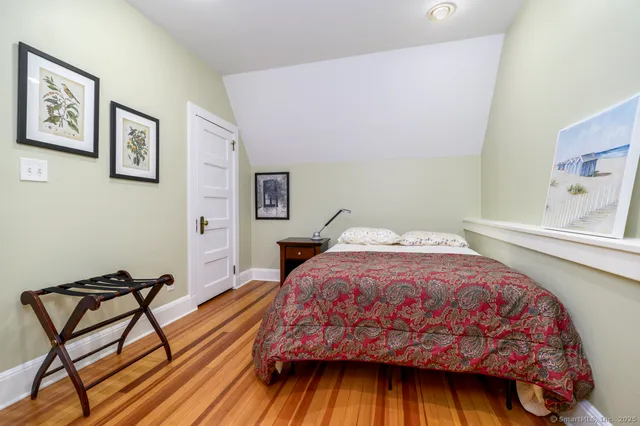 a view of workspace with wooden floor windows