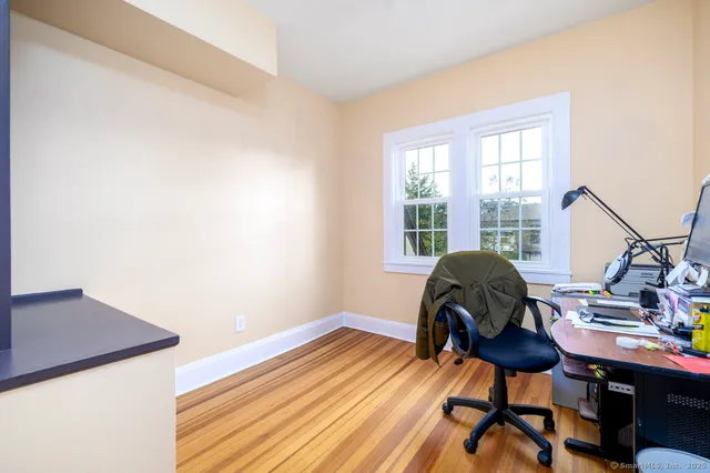 a view of a swimming pool with building in the background