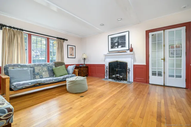 a view of a room with gym equipment and floor to ceiling window