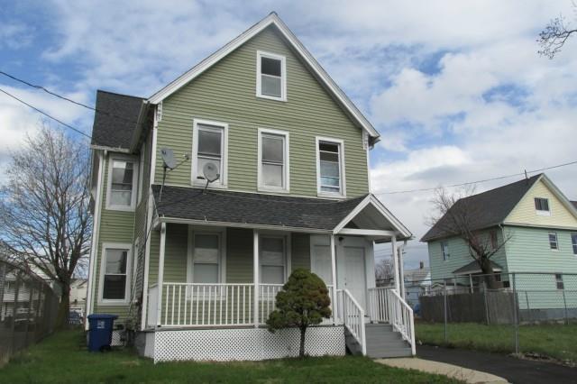 32 3rd Street Bridgeport, CT 06607 - Photo 1 of 1 a view of a house with a yard