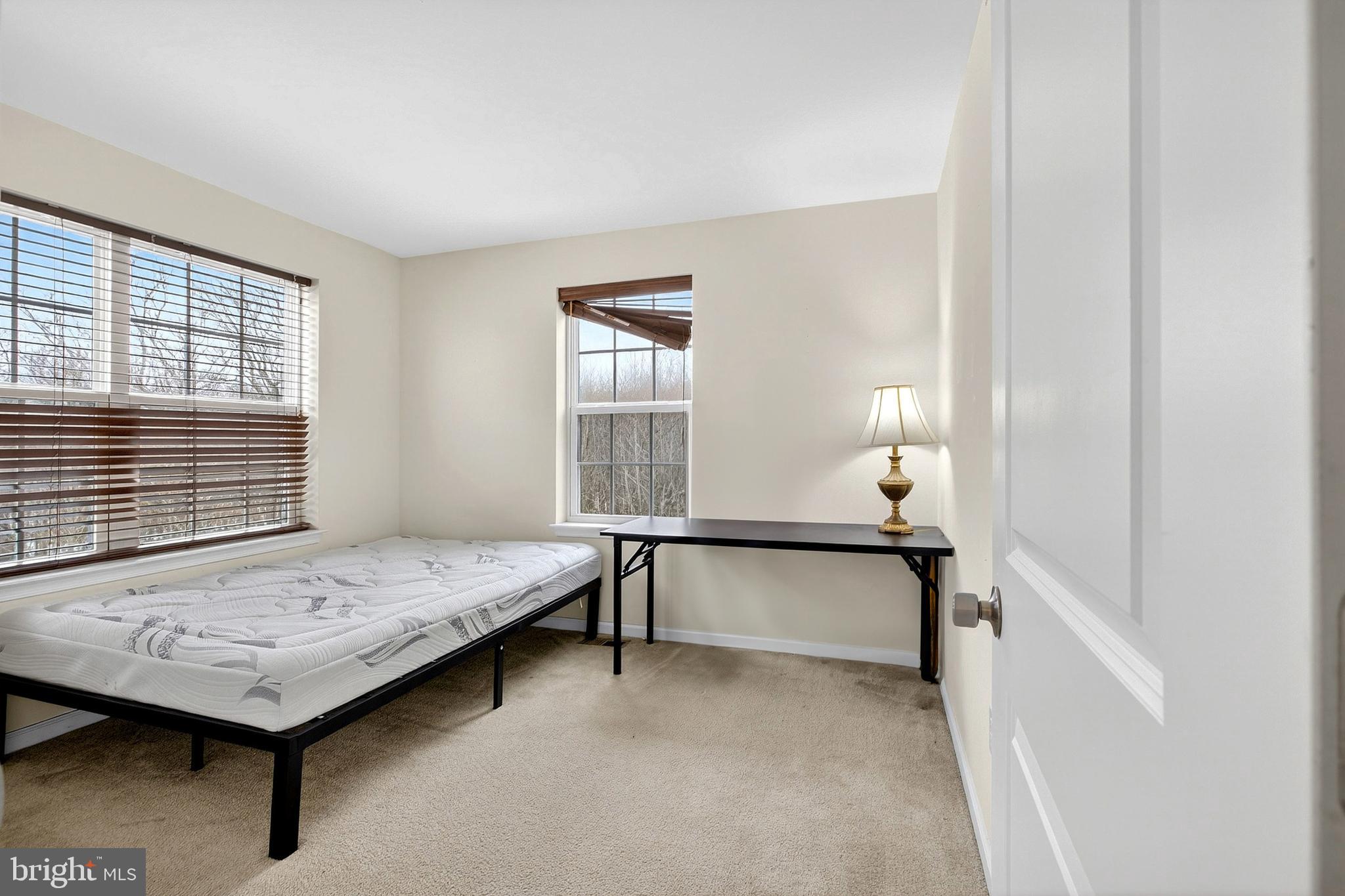 48 Munro Road Newark, DE 19711 - Photo 26 of 50 a bedroom with a bed and window
