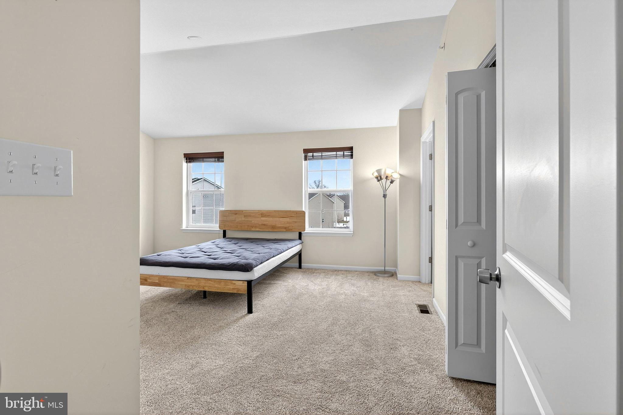 48 Munro Road Newark, DE 19711 - Photo 28 of 50 a room with furniture and a chandelier