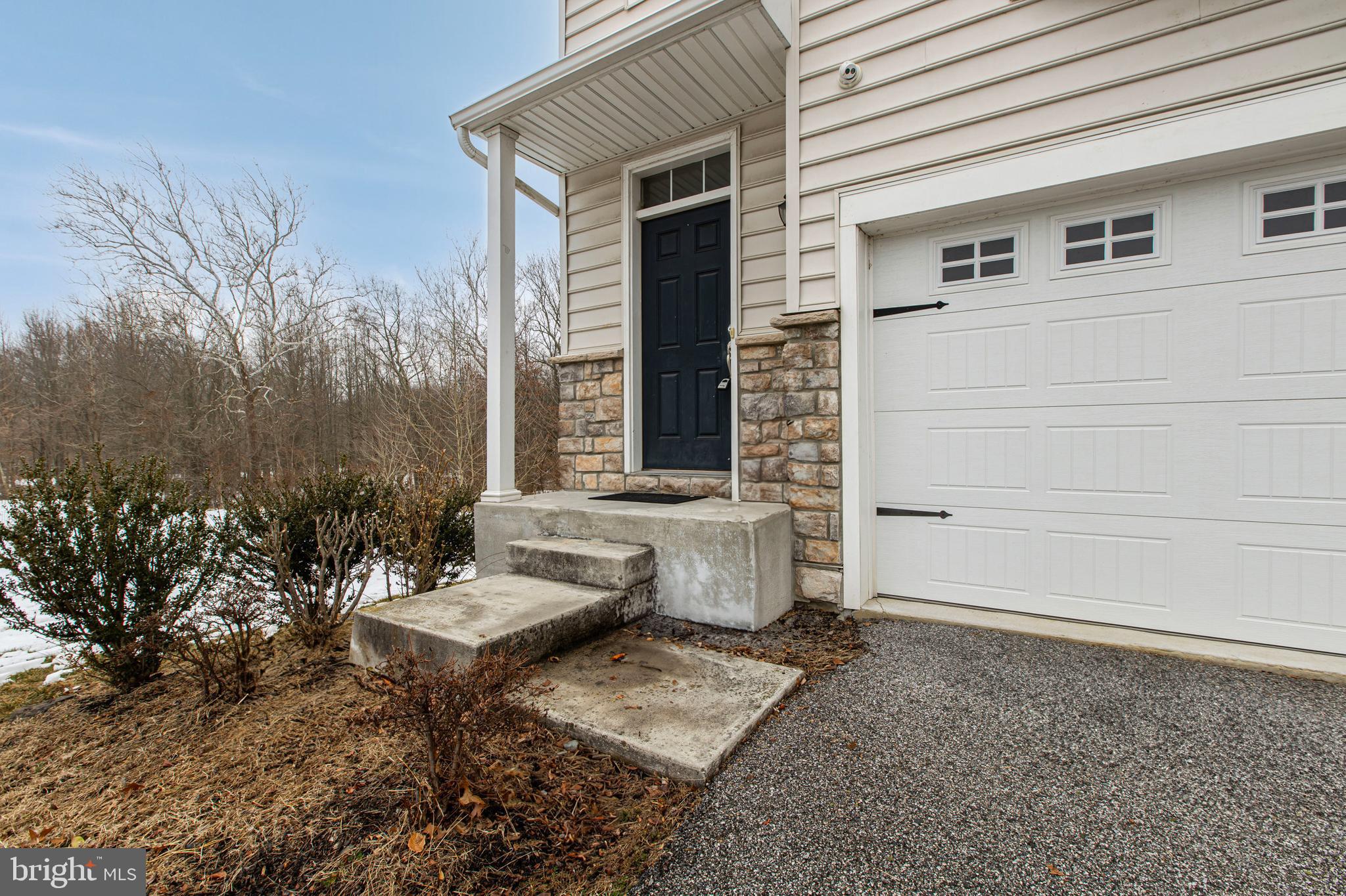 48 Munro Road Newark, DE 19711 - Photo 3 of 50 a view of a patio with couches table and chairs and potted plants