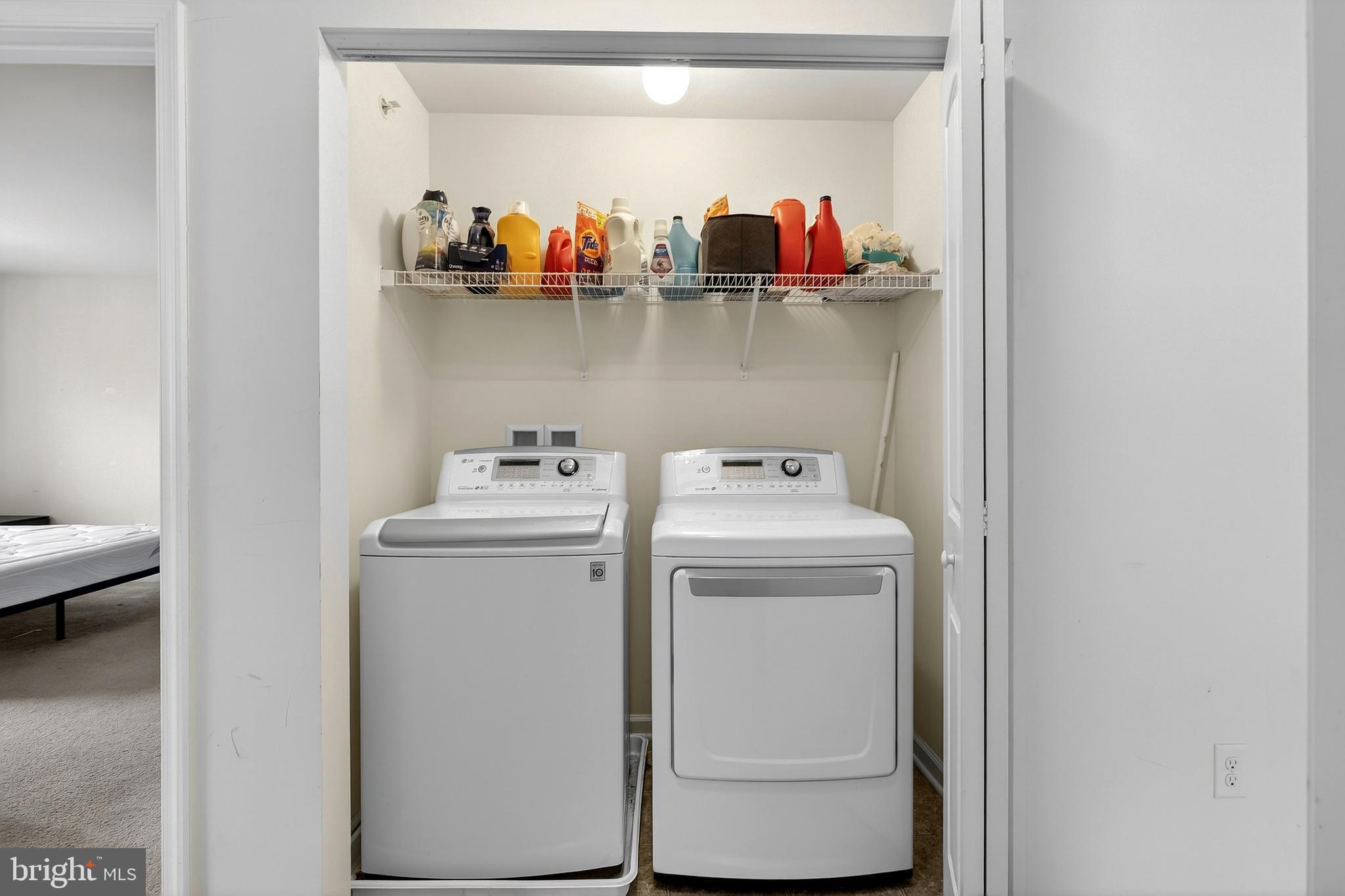 48 Munro Road Newark, DE 19711 - Photo 35 of 50 a utility room with dryer and washer
