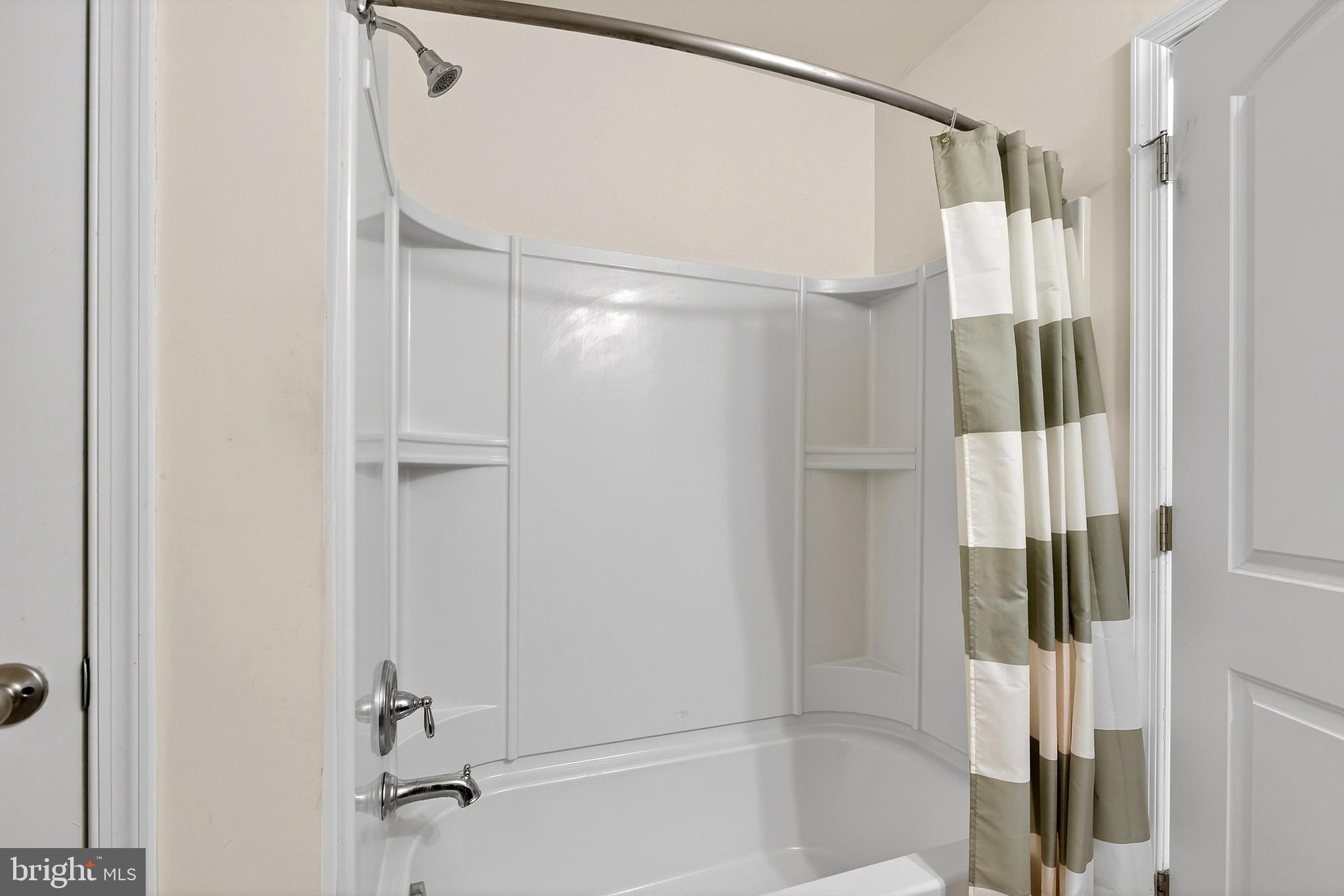 48 Munro Road Newark, DE 19711 - Photo 37 of 50 a bathroom with a glass shower door