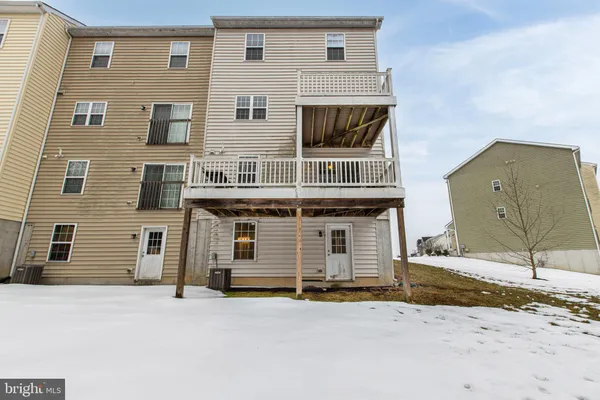 a view of a house with a patio