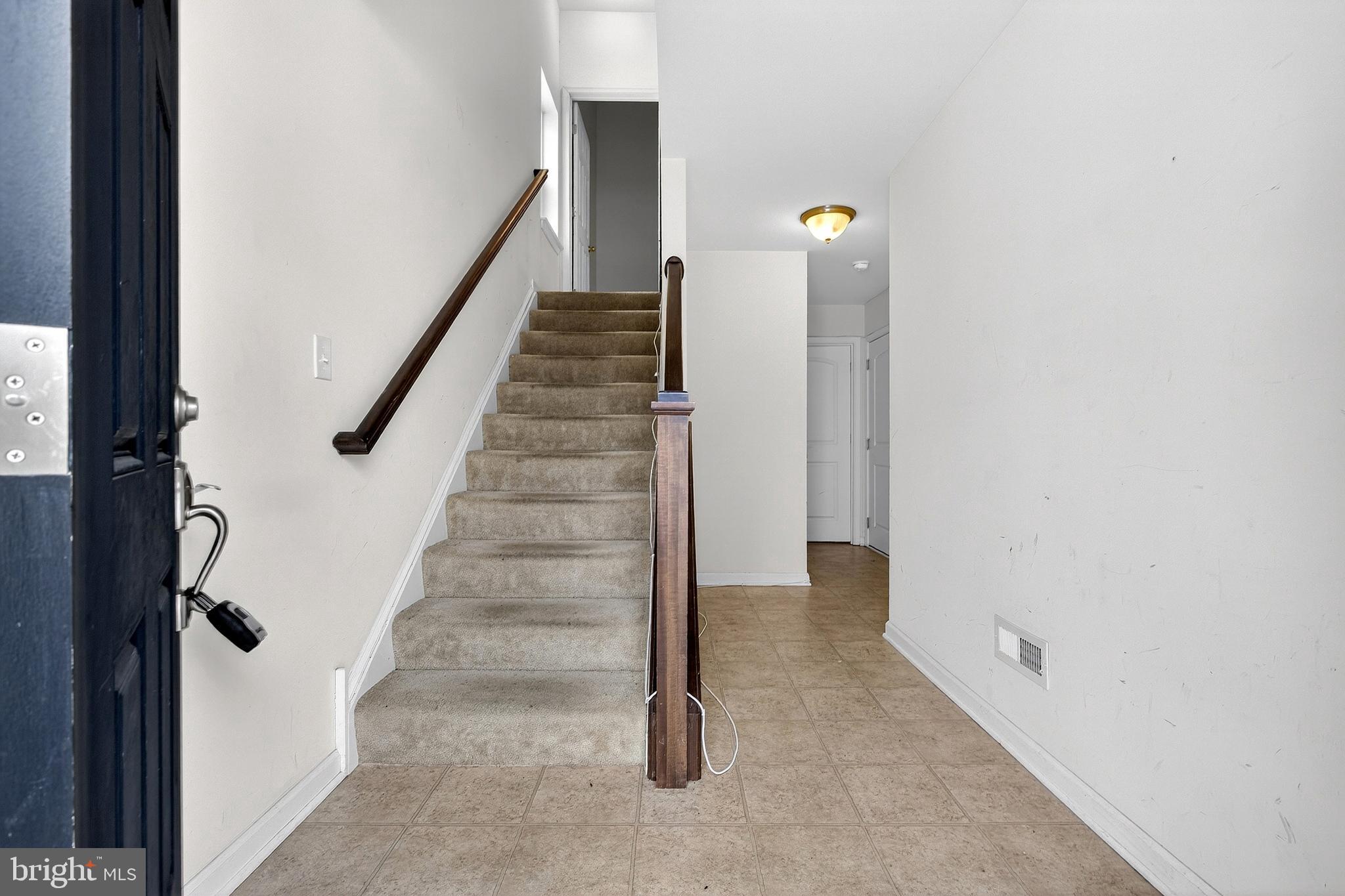 48 Munro Road Newark, DE 19711 - Photo 5 of 50 a view of a hallway with staircase