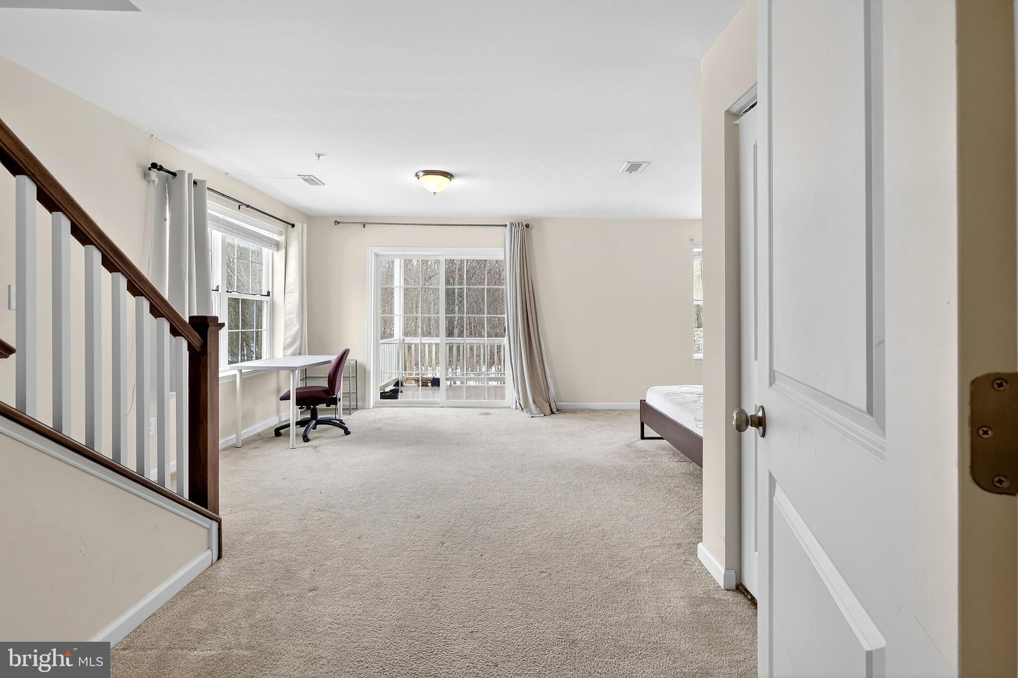 48 Munro Road Newark, DE 19711 - Photo 6 of 50 wooden floor and chair in a room