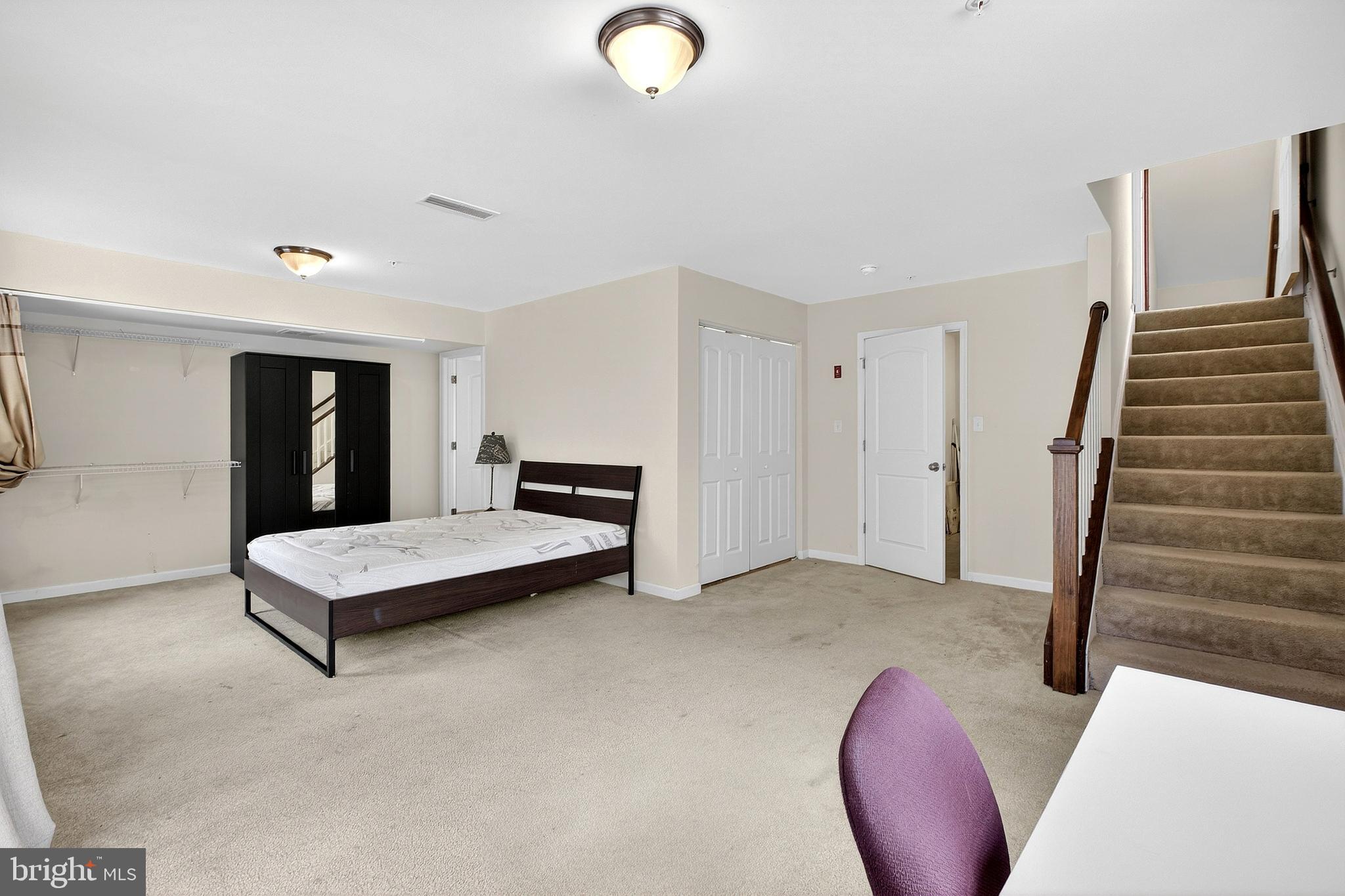 48 Munro Road Newark, DE 19711 - Photo 8 of 50 a view of an empty room with stairs and furniture