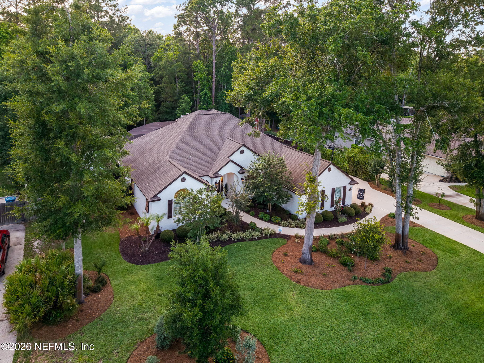 1204 Creek Bend Road St. Johns, FL 32259 - Photo 2 of 107 a view of a house with a yard and tree s