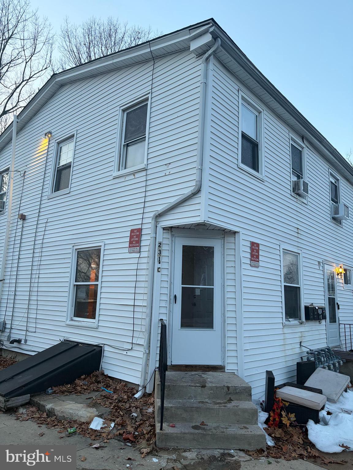 231 Broad Street, Unit C Beverly, NJ 08010 - Photo 1 of 7 a view of a house with a patio