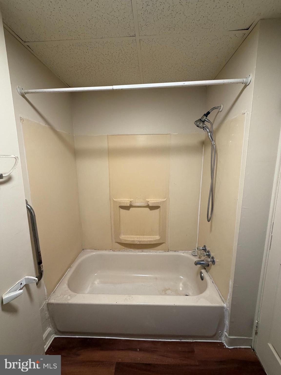 231 Broad Street, Unit C Beverly, NJ 08010 - Photo 3 of 7 a bathroom with a sink a toilet and a bathtub