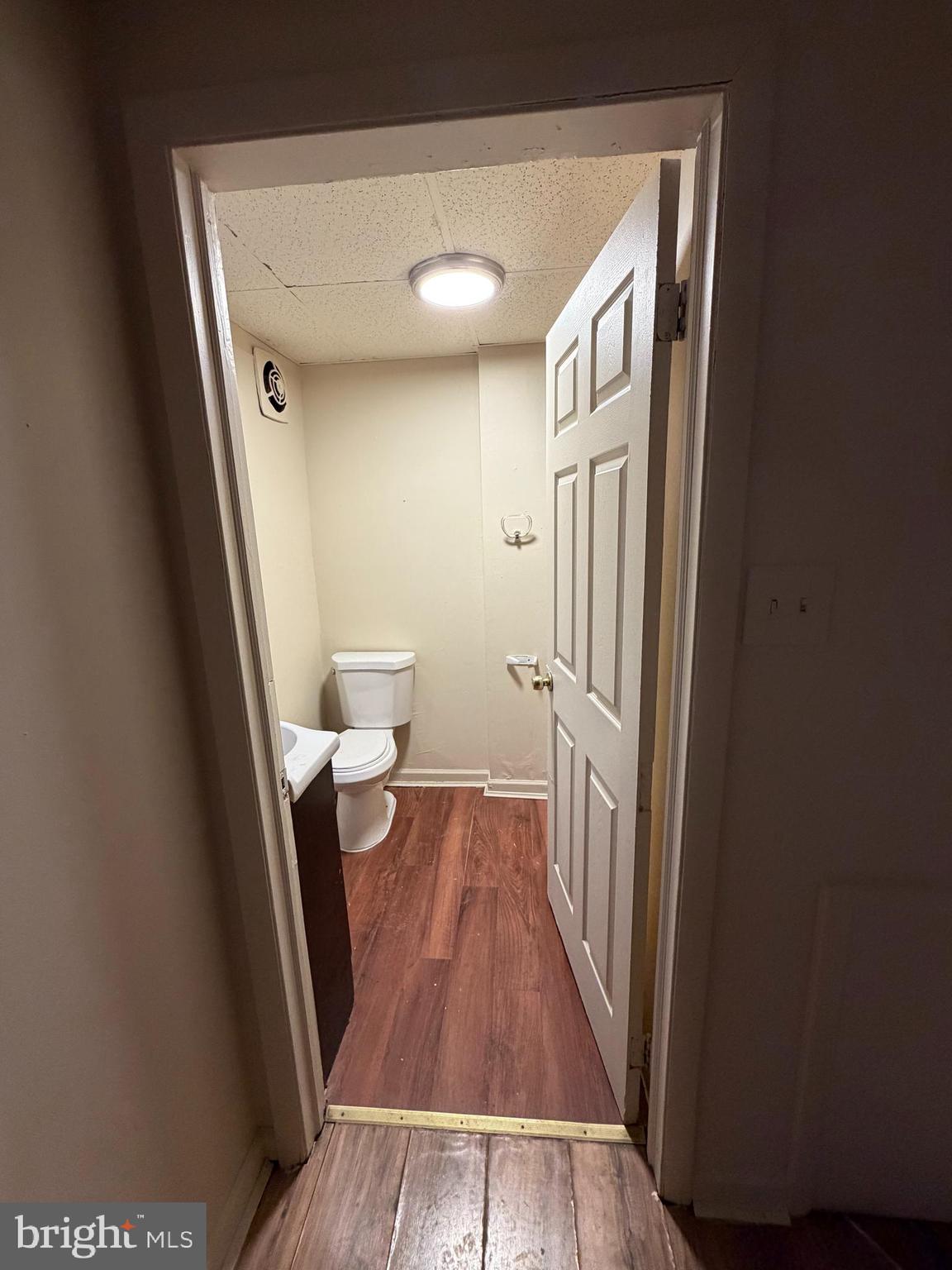 231 Broad Street, Unit C Beverly, NJ 08010 - Photo 7 of 7 a view of a hallway and wooden floor