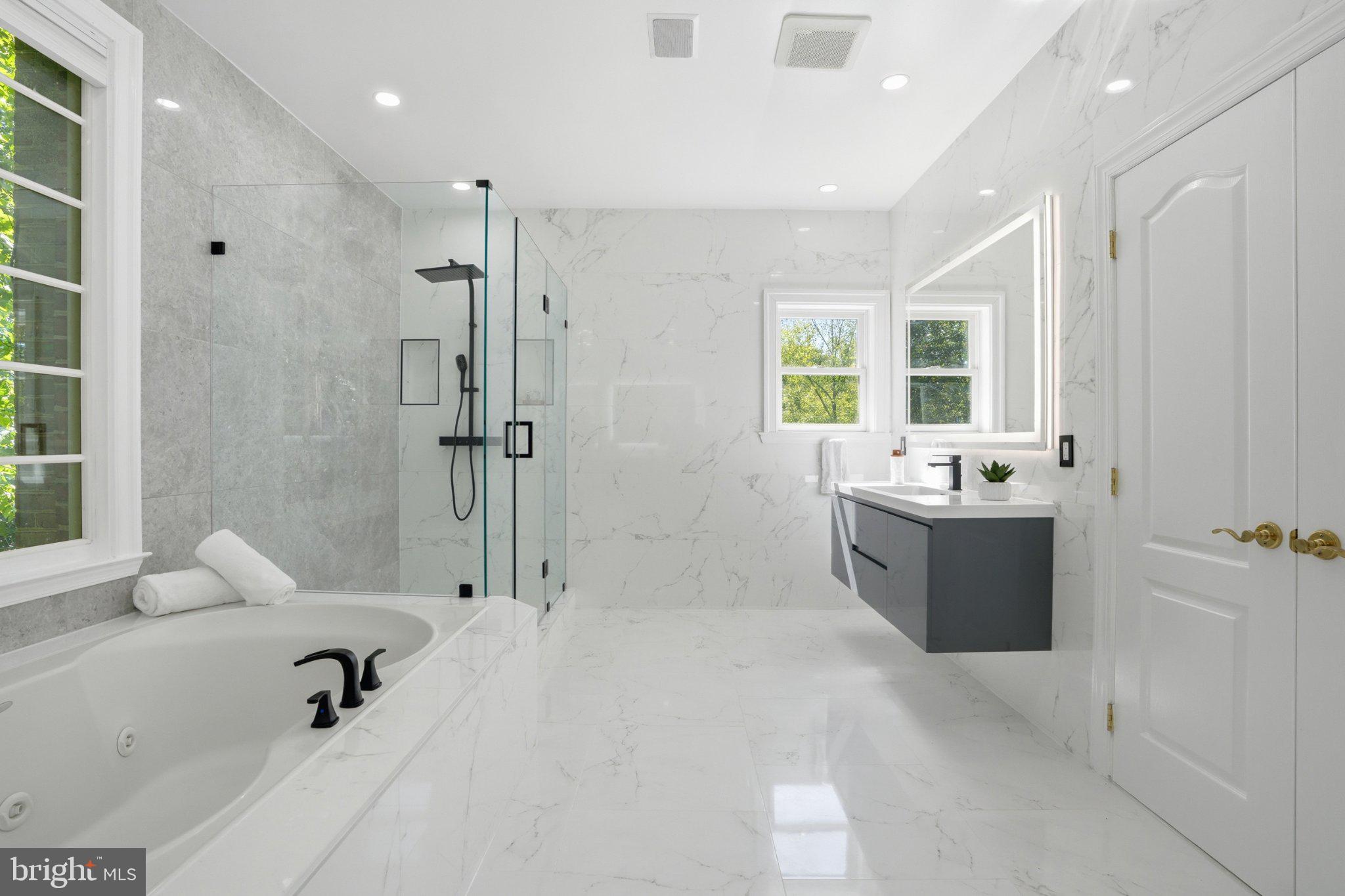 891 Chinquapin Road McLean, VA 22102 - Photo 51 of 78 Luxurious marble-clad bathroom oasis.