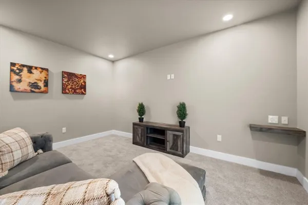 a bedroom with a bed and furniture