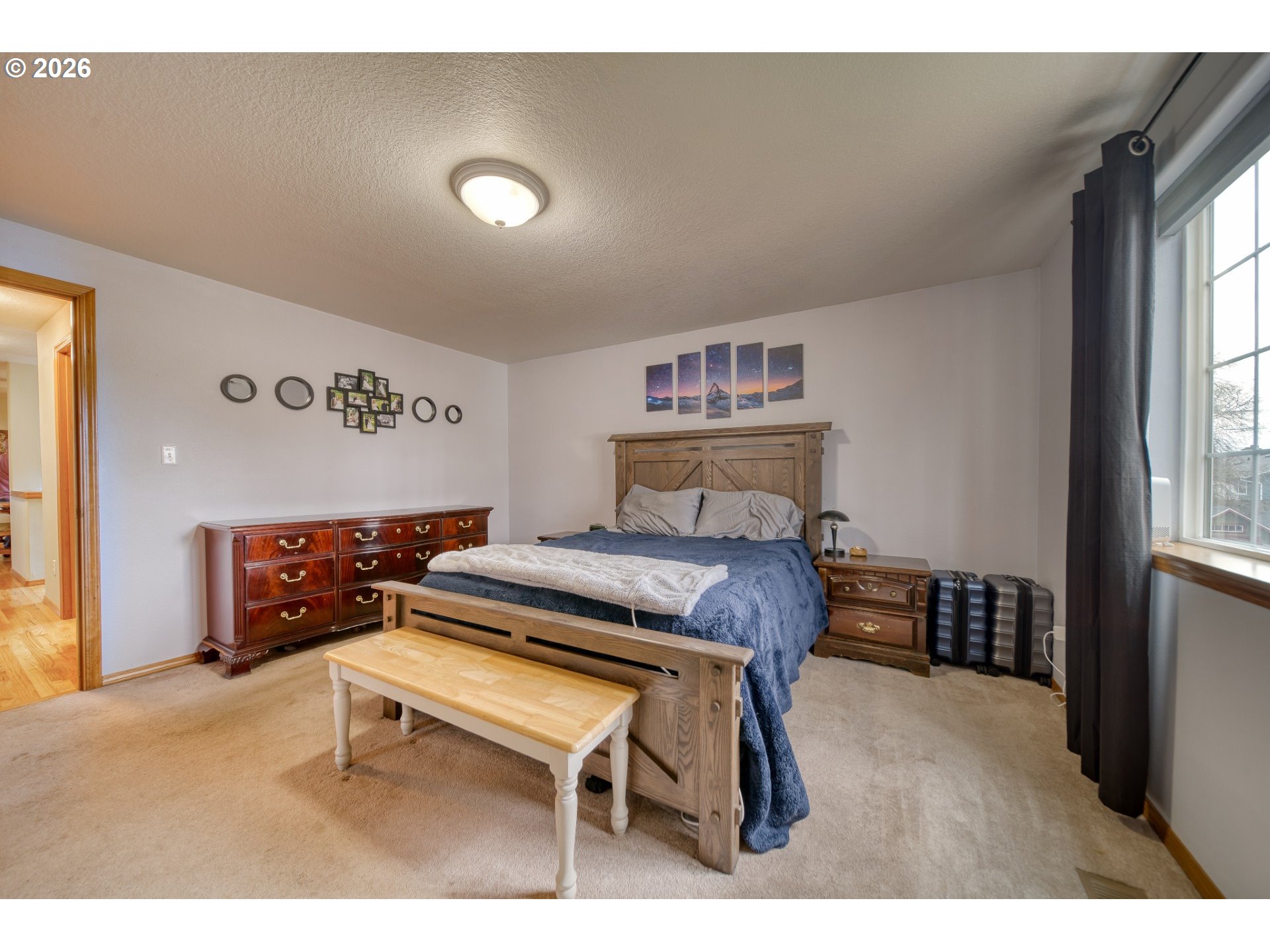 435 South 8th Street St. Helens, OR 97051 - Photo 12 of 39 a bedroom with a bed and a large window