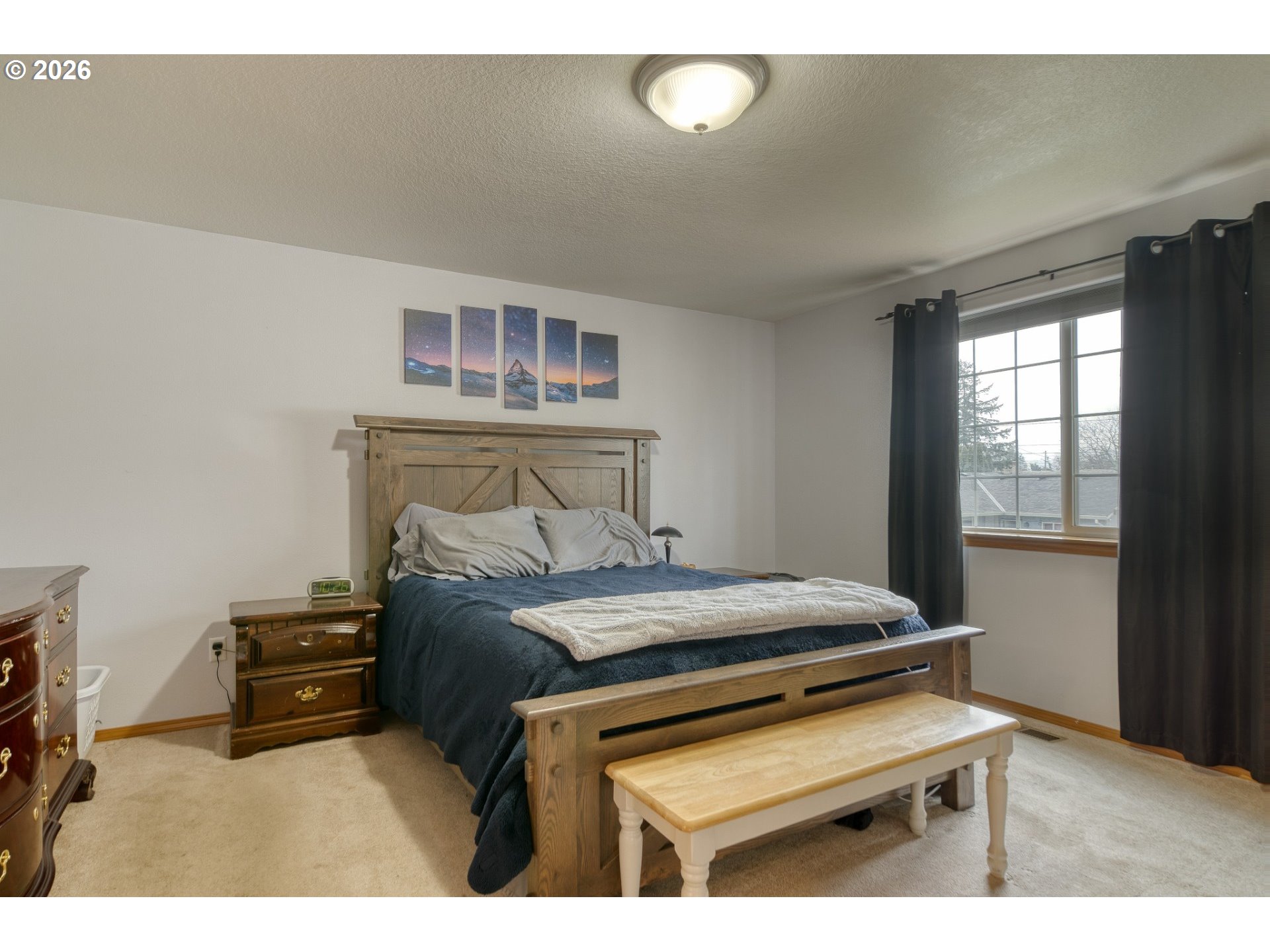 435 South 8th Street St. Helens, OR 97051 - Photo 13 of 39 a bedroom with a bed and a tv
