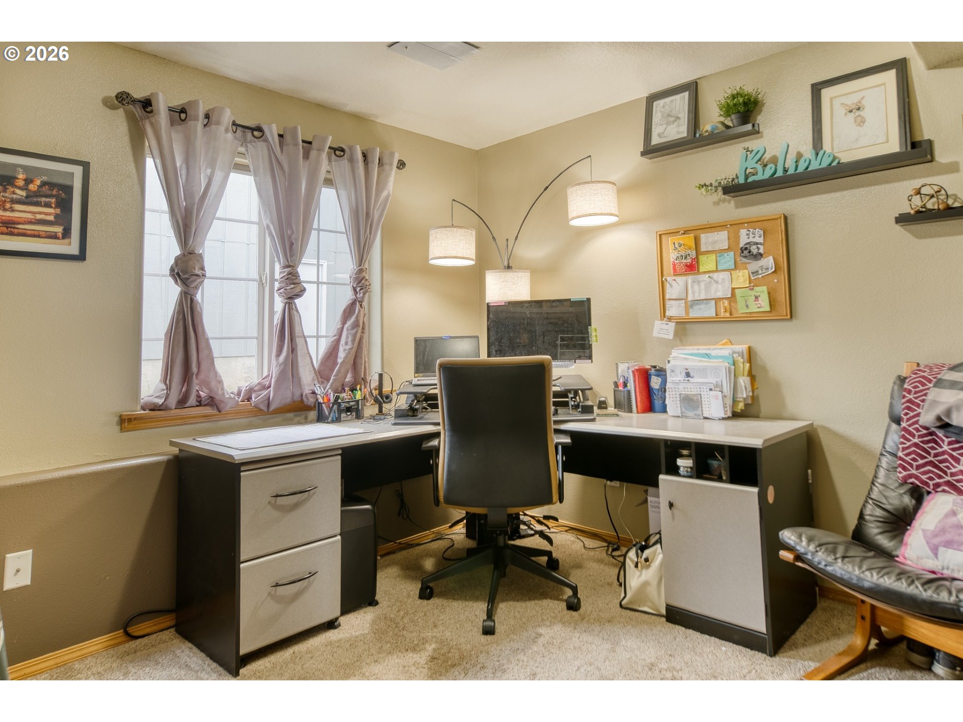 435 South 8th Street St. Helens, OR 97051 - Photo 21 of 39 a view of a workspace with furniture and a window