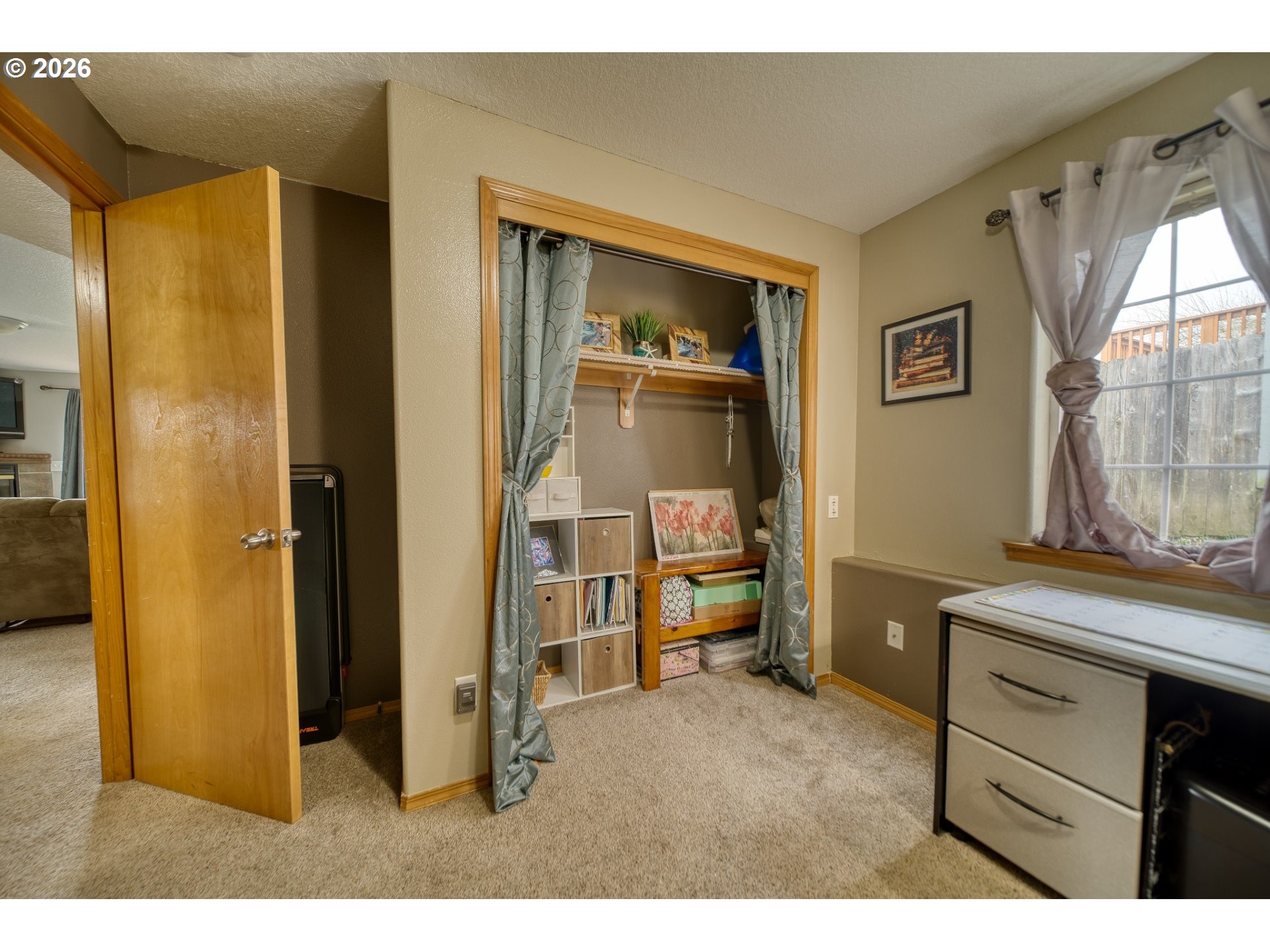 435 South 8th Street St. Helens, OR 97051 - Photo 22 of 39 a living room with a dresser and a window
