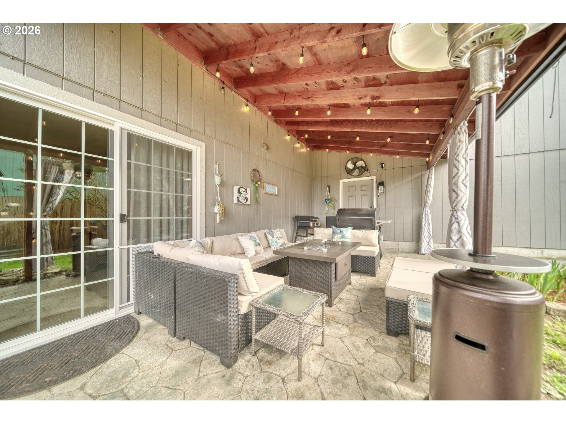 435 South 8th Street St. Helens, OR 97051 - Photo 30 of 39 a living room with furniture a large window and chandelier