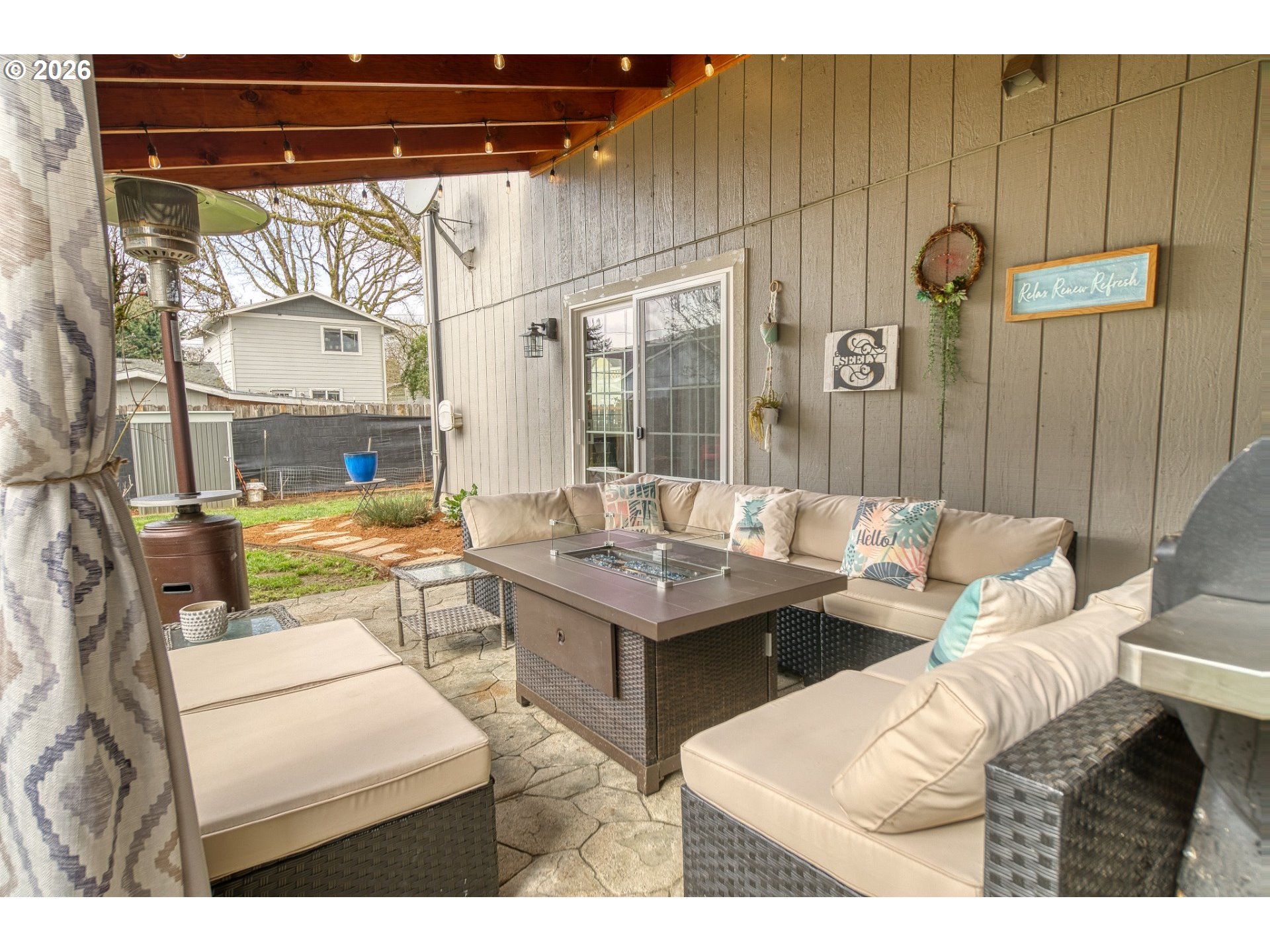 435 South 8th Street St. Helens, OR 97051 - Photo 32 of 39 a living room with furniture and a clock