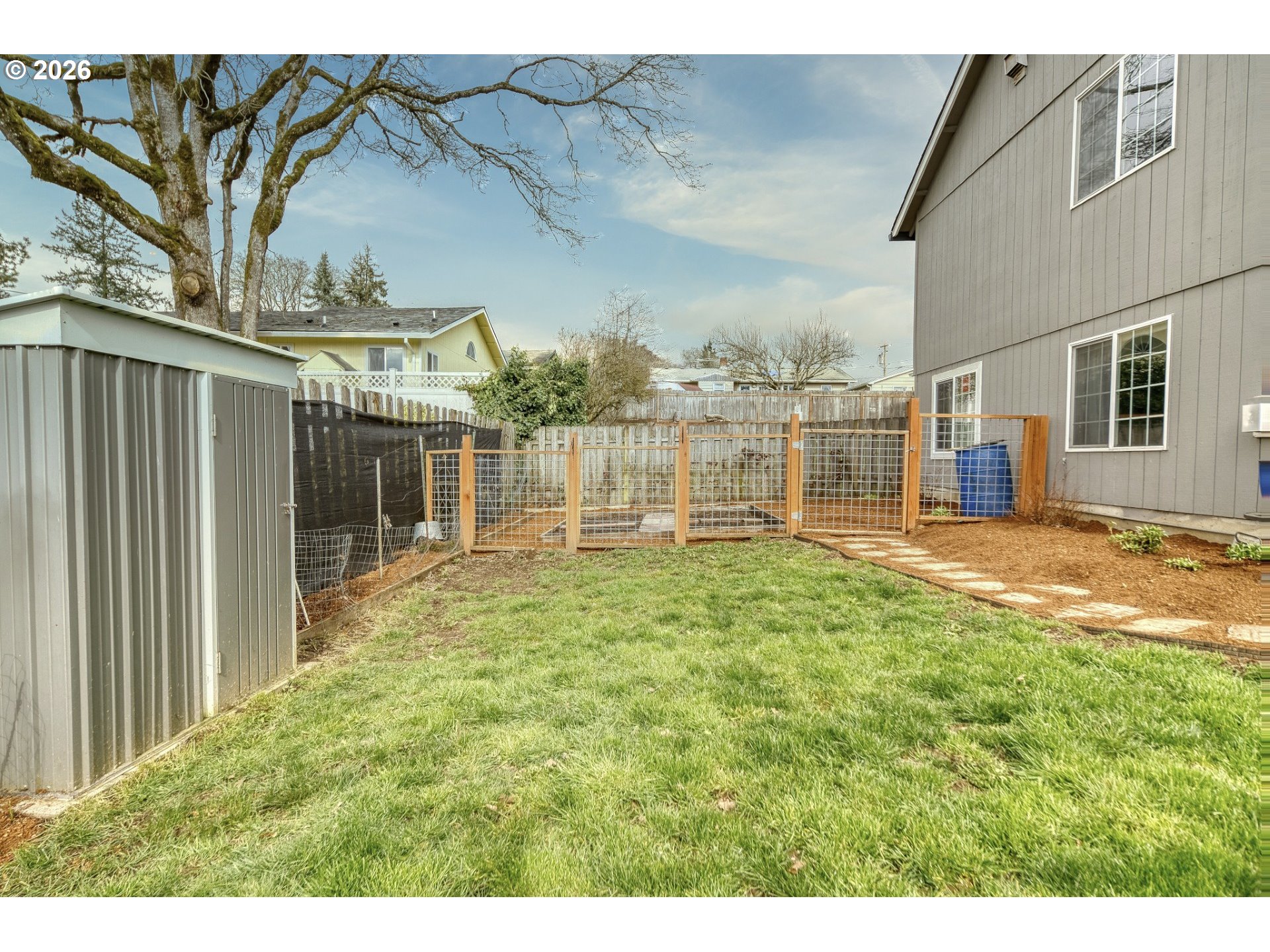 435 South 8th Street St. Helens, OR 97051 - Photo 36 of 39 a backyard of a house with table and chairs