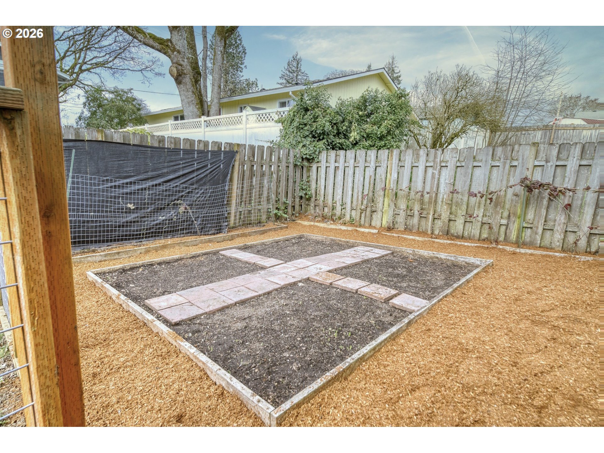 435 South 8th Street St. Helens, OR 97051 - Photo 38 of 39 a view of a backyard with wooden fence
