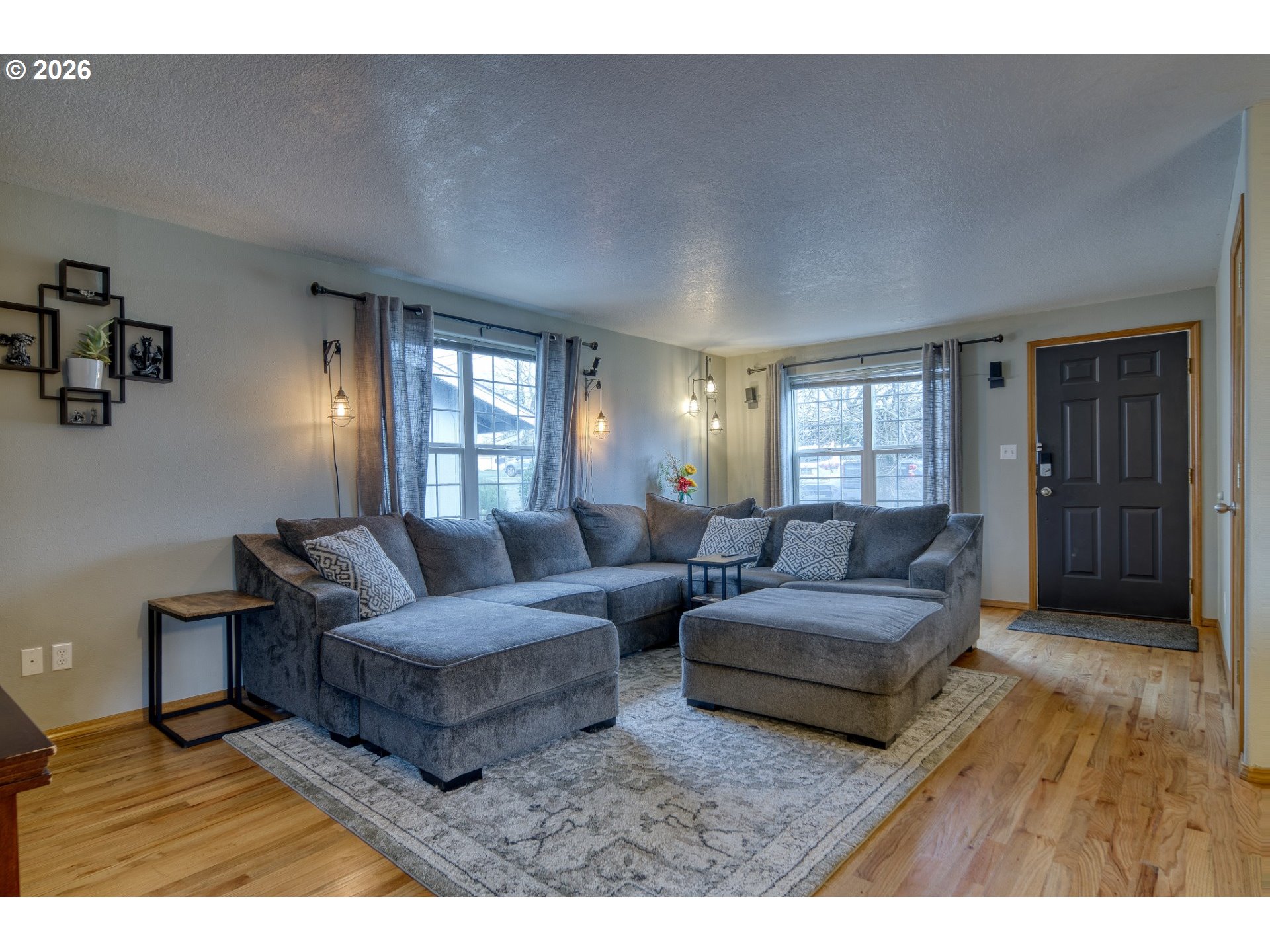 435 South 8th Street St. Helens, OR 97051 - Photo 4 of 39 a living room with couches and a view of kitchen