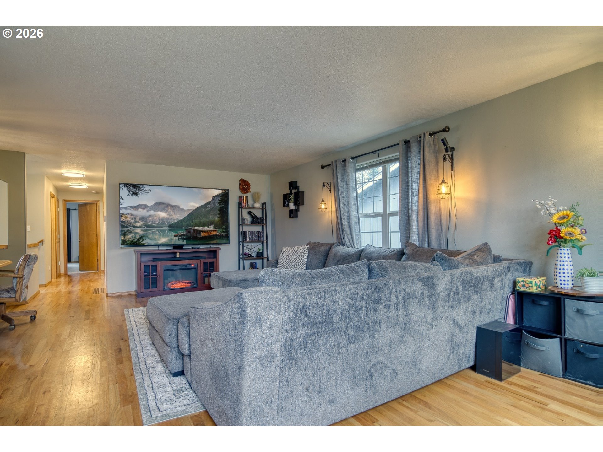 435 South 8th Street St. Helens, OR 97051 - Photo 5 of 39 a living room with furniture and a flat screen tv