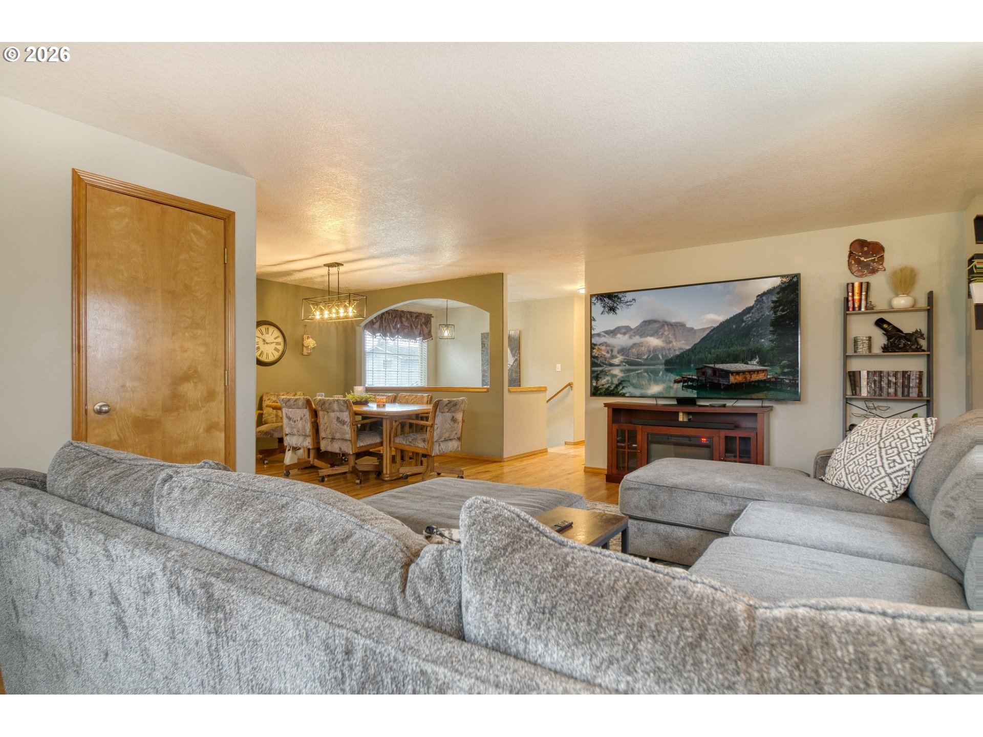 435 South 8th Street St. Helens, OR 97051 - Photo 6 of 39 a living room with furniture and a flat screen tv