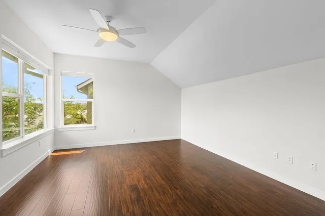 a bathroom with a shower and a sink
