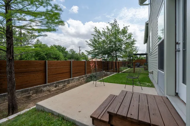a view of backyard with wooden floor