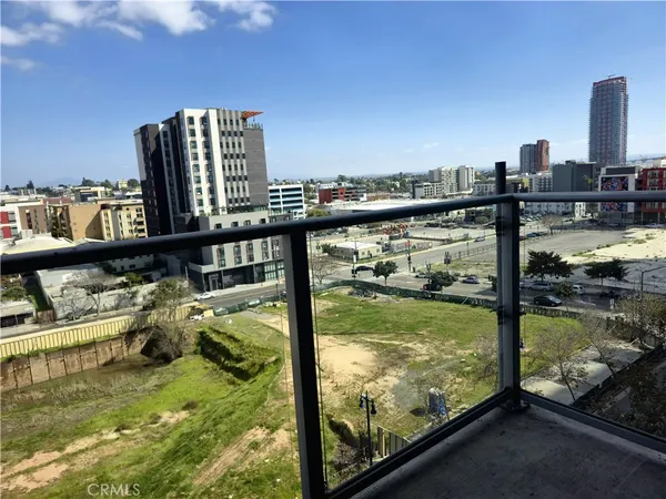 a view of swimming pool from a balcony