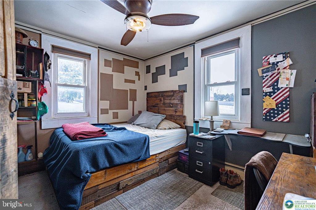 2303 South Filbert Street Allentown, PA 18103 - Photo 14 of 61 a bedroom with a bed dresser and a window