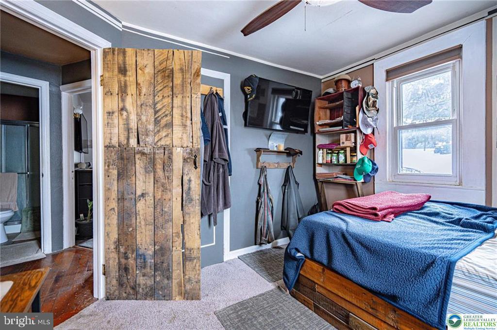 2303 South Filbert Street Allentown, PA 18103 - Photo 15 of 61 a bedroom with a bed and a window