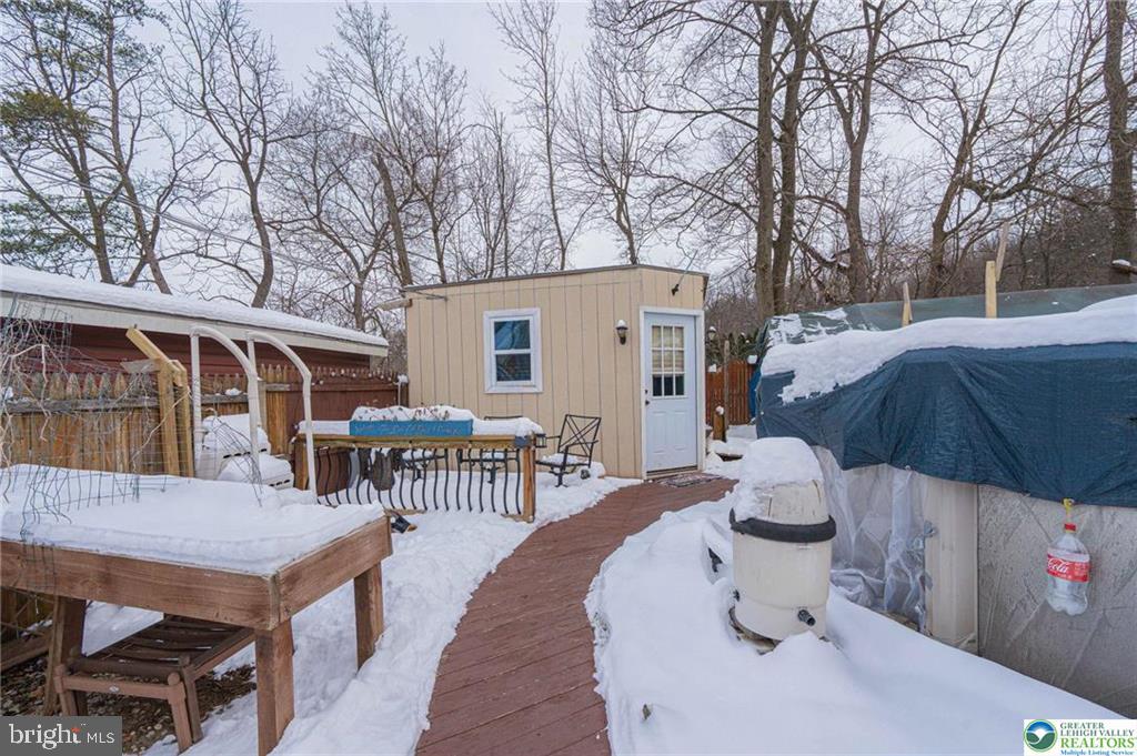2303 South Filbert Street Allentown, PA 18103 - Photo 34 of 61 a backyard of a house with table and chairs