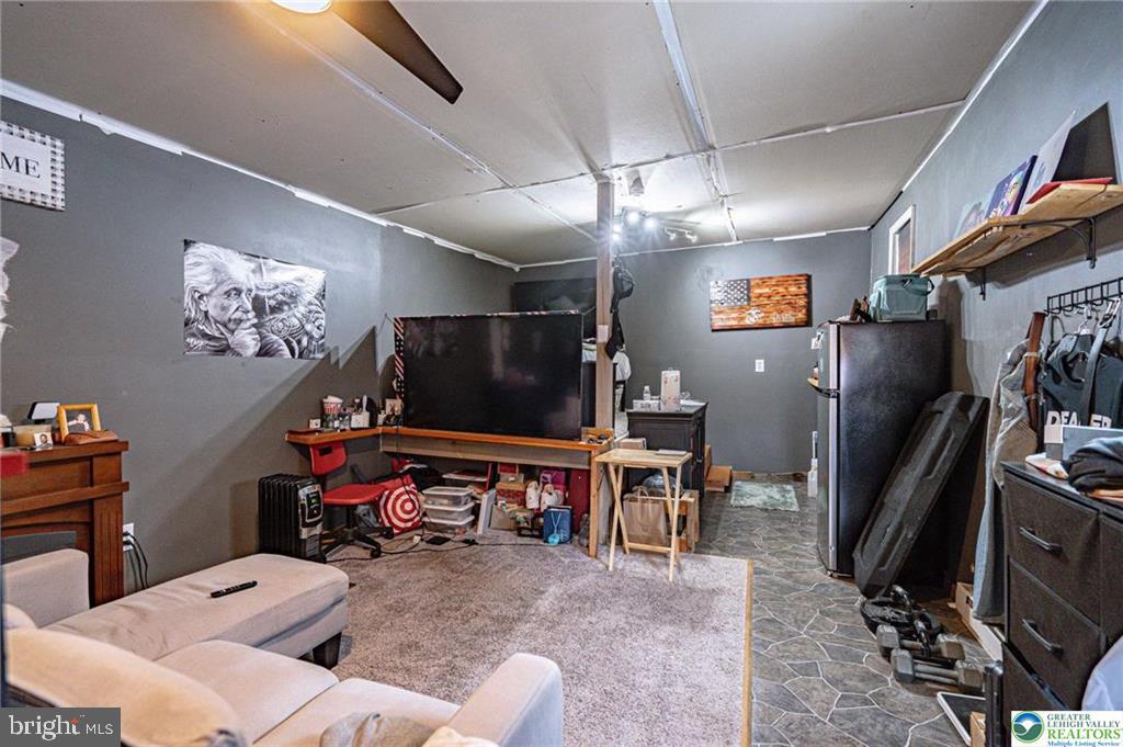 2303 South Filbert Street Allentown, PA 18103 - Photo 37 of 61 a view of a livingroom with furniture and a flat screen tv