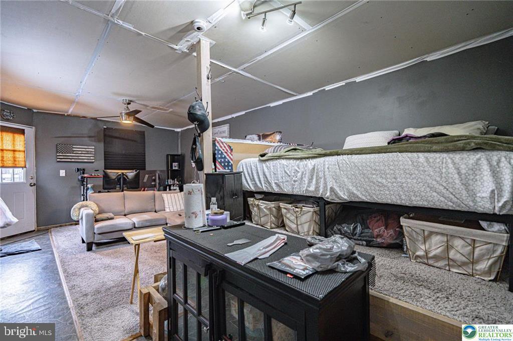 2303 South Filbert Street Allentown, PA 18103 - Photo 40 of 61 a living room with furniture and a fireplace