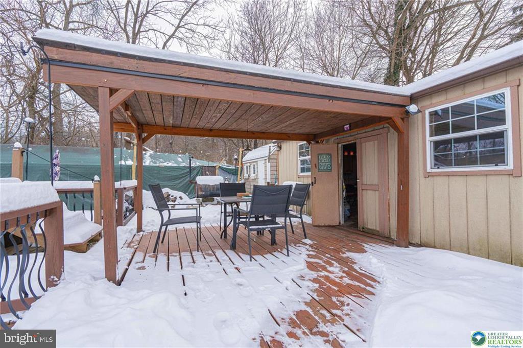 2303 South Filbert Street Allentown, PA 18103 - Photo 45 of 61 a view of a patio with table and chairs with wooden floor and fence