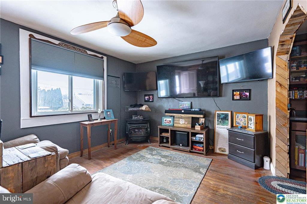 2303 South Filbert Street Allentown, PA 18103 - Photo 7 of 61 a living room with furniture and a flat screen tv