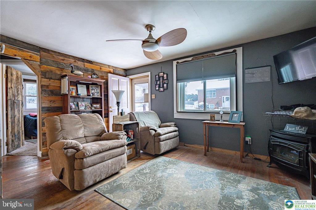 2303 South Filbert Street Allentown, PA 18103 - Photo 8 of 61 a living room with furniture and a window
