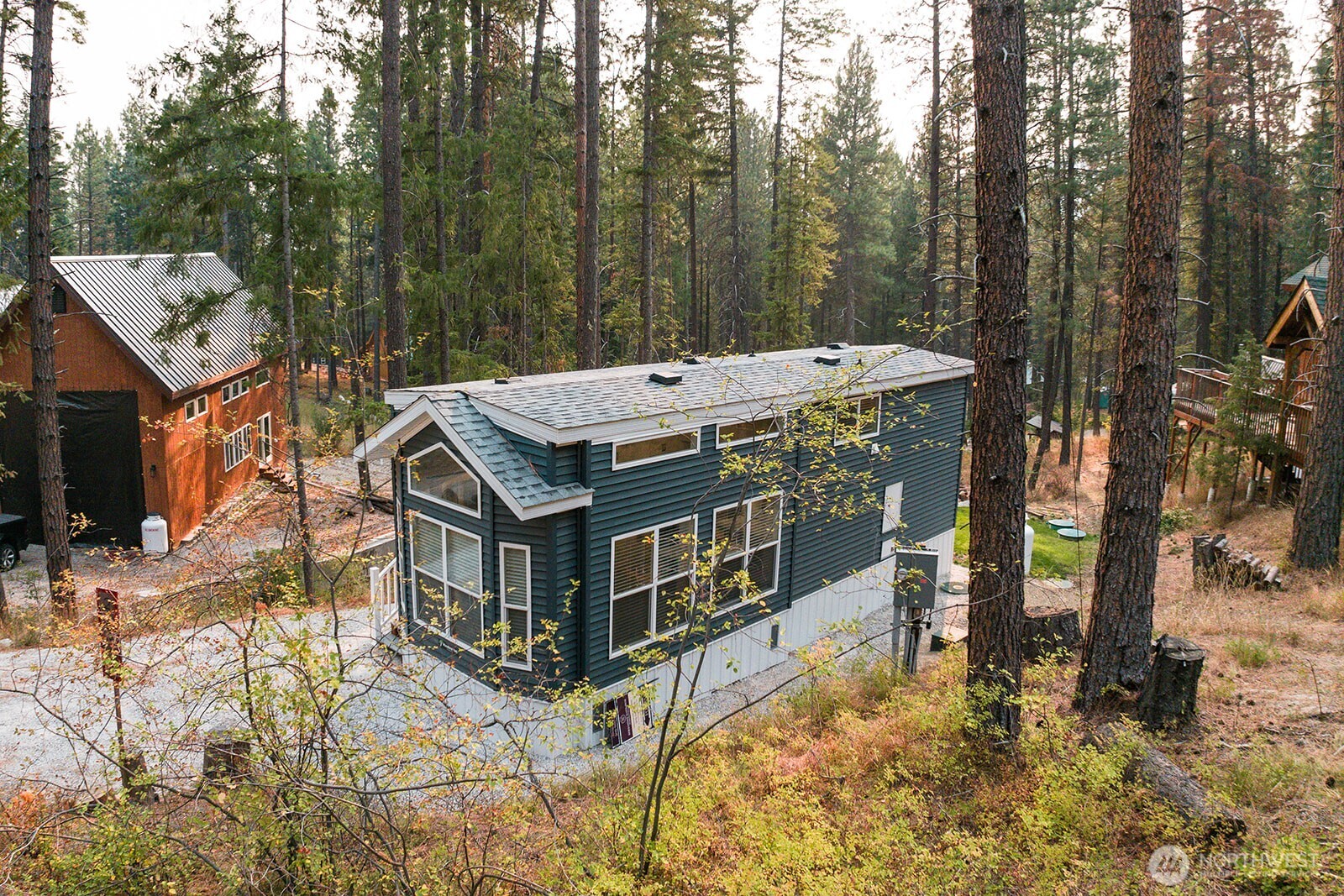 a view of a house with a yard patio and deck