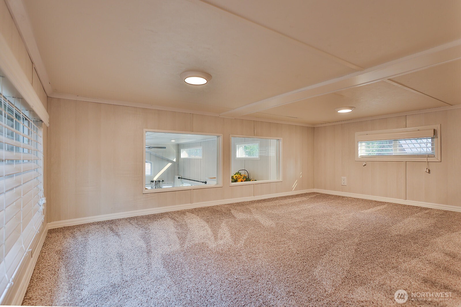 21512 Camp 12 Road Leavenworth, WA 98826 - Photo 15 of 40 an empty room with windows and entrance