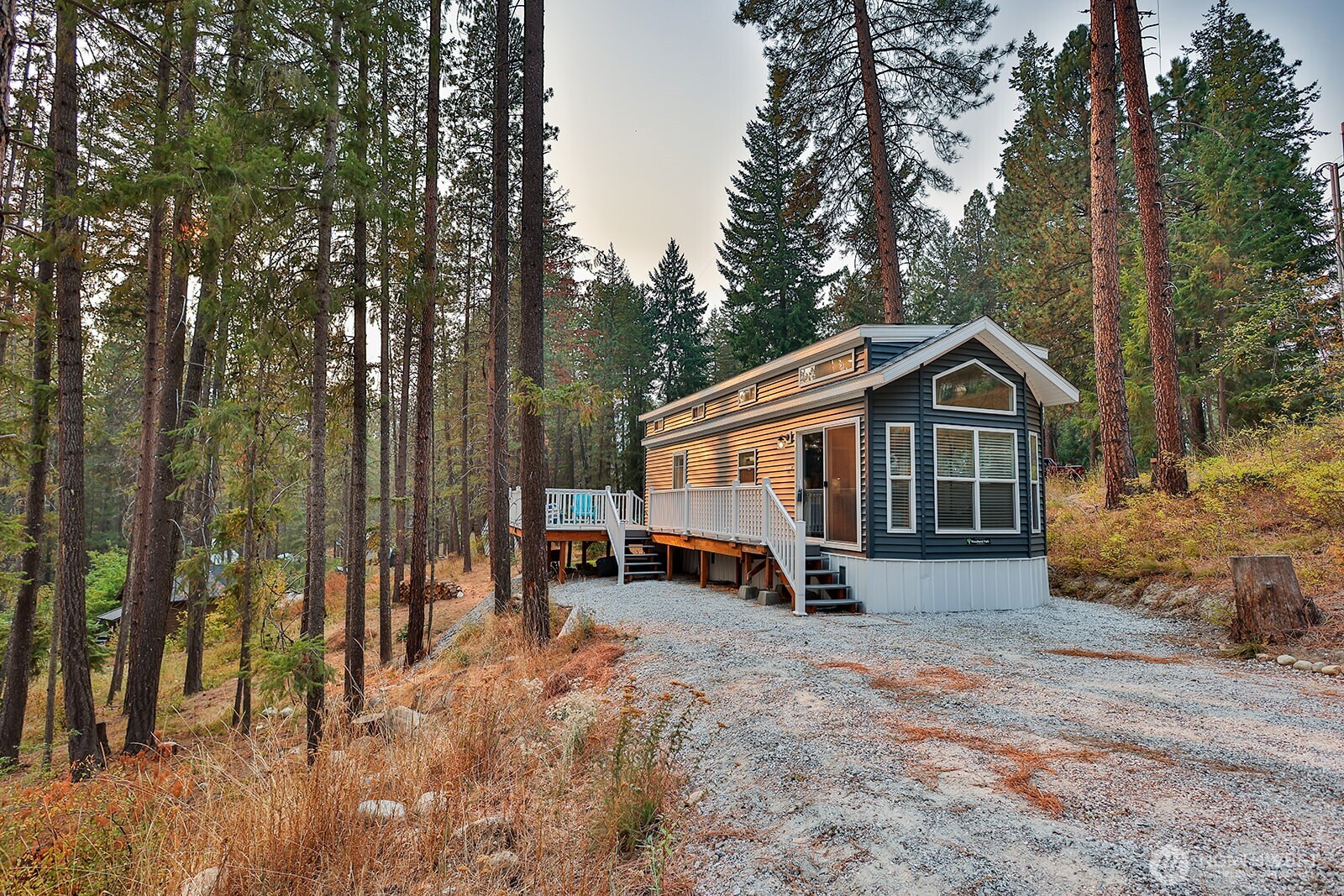 21512 Camp 12 Road Leavenworth, WA 98826 - Photo 29 of 40 a view of a house with a yard and sitting area