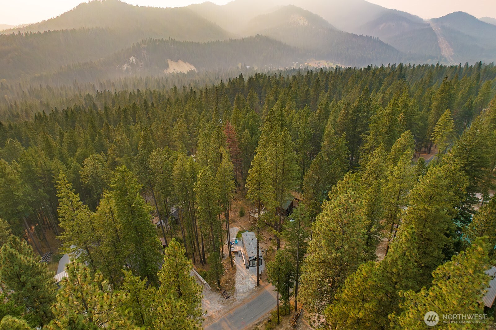 21512 Camp 12 Road Leavenworth, WA 98826 - Photo 34 of 40 a view of a lush green hillside and houses