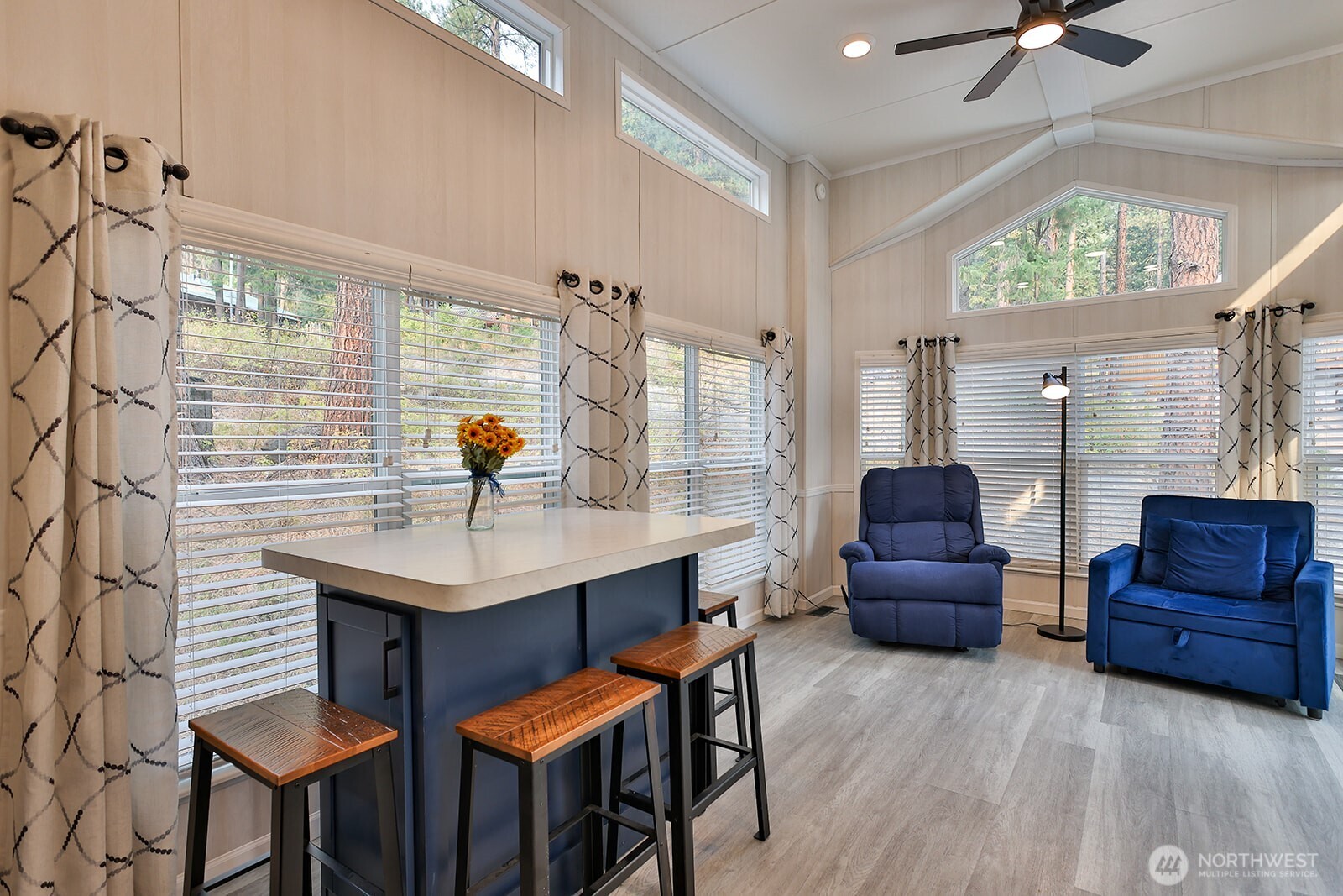 21512 Camp 12 Road Leavenworth, WA 98826 - Photo 7 of 40 a living room with furniture and a large window