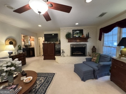 410 Preston Street Metter, GA 30439 - Photo 29 of 39 a living room with furniture and a fireplace