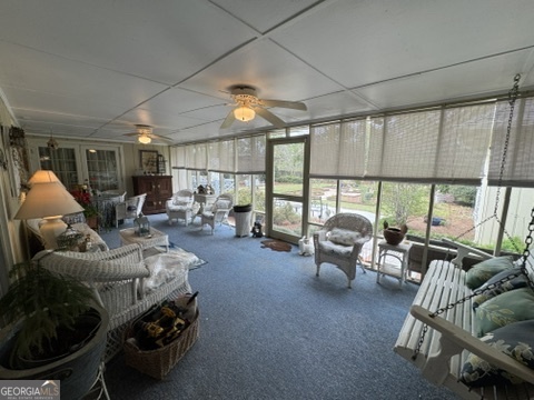 410 Preston Street Metter, GA 30439 - Photo 4 of 39 a living room with furniture and a large window