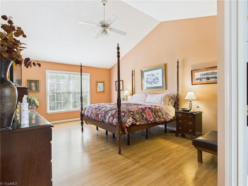 4212 Suffolk Trail Greensboro, NC 27407 - Photo 28 of 40 Primary bedroom that's so large this king bedroom suite looks small!!!