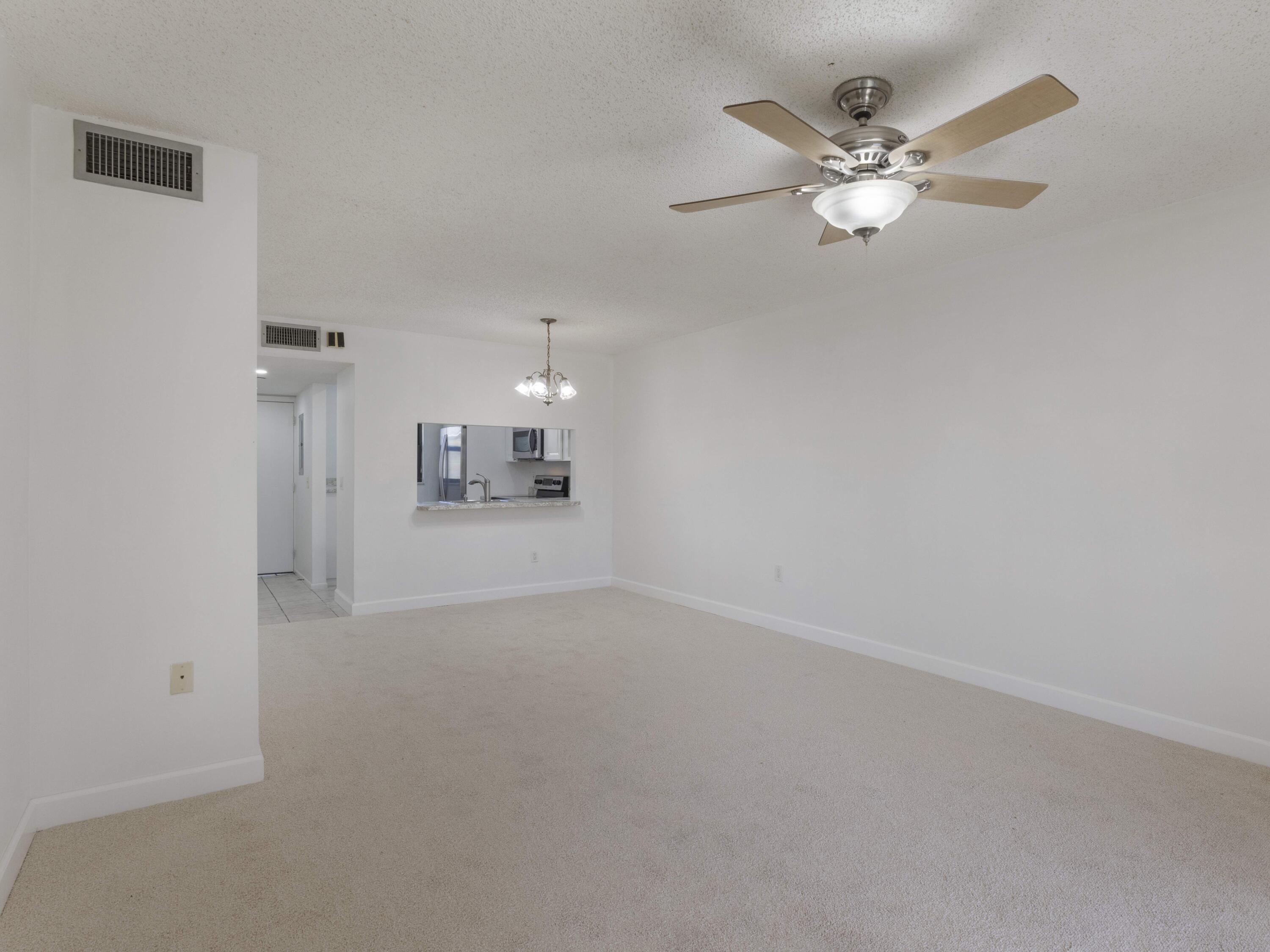 151 Northwest 93rd Avenue, Unit 151 Pembroke Pines, FL 33024 - Photo 17 of 37 Living to Dining Alt View